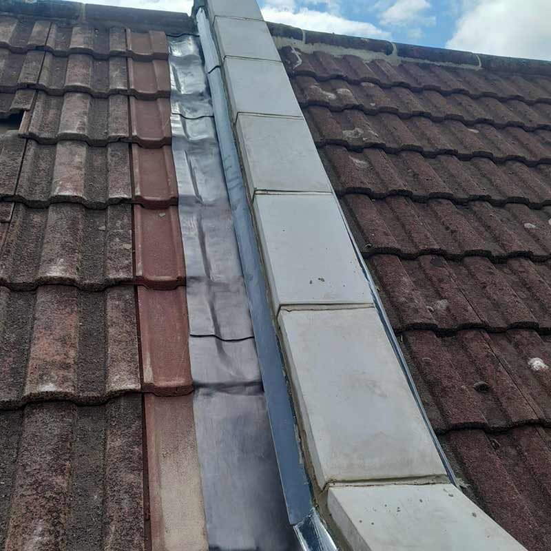 New lead flashing and coping stones around a parapet wall in Portsmouth