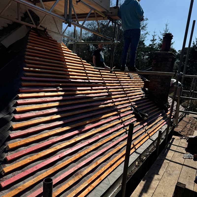Machine made clay tile roof replacement in Portsmouth with breathable membrane and treated battens