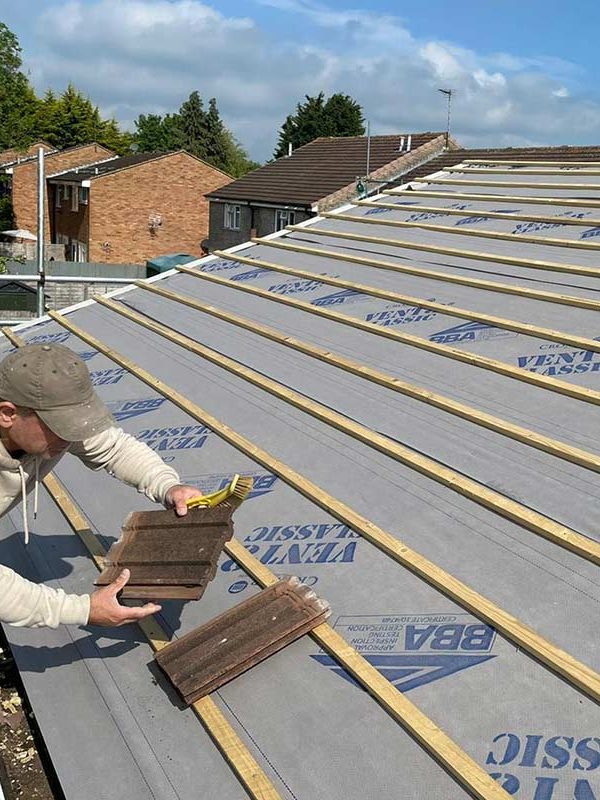 Local roofing experts working on a Portsmouth property